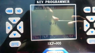 
			SKP900 key programmer program Dodge key step by step		